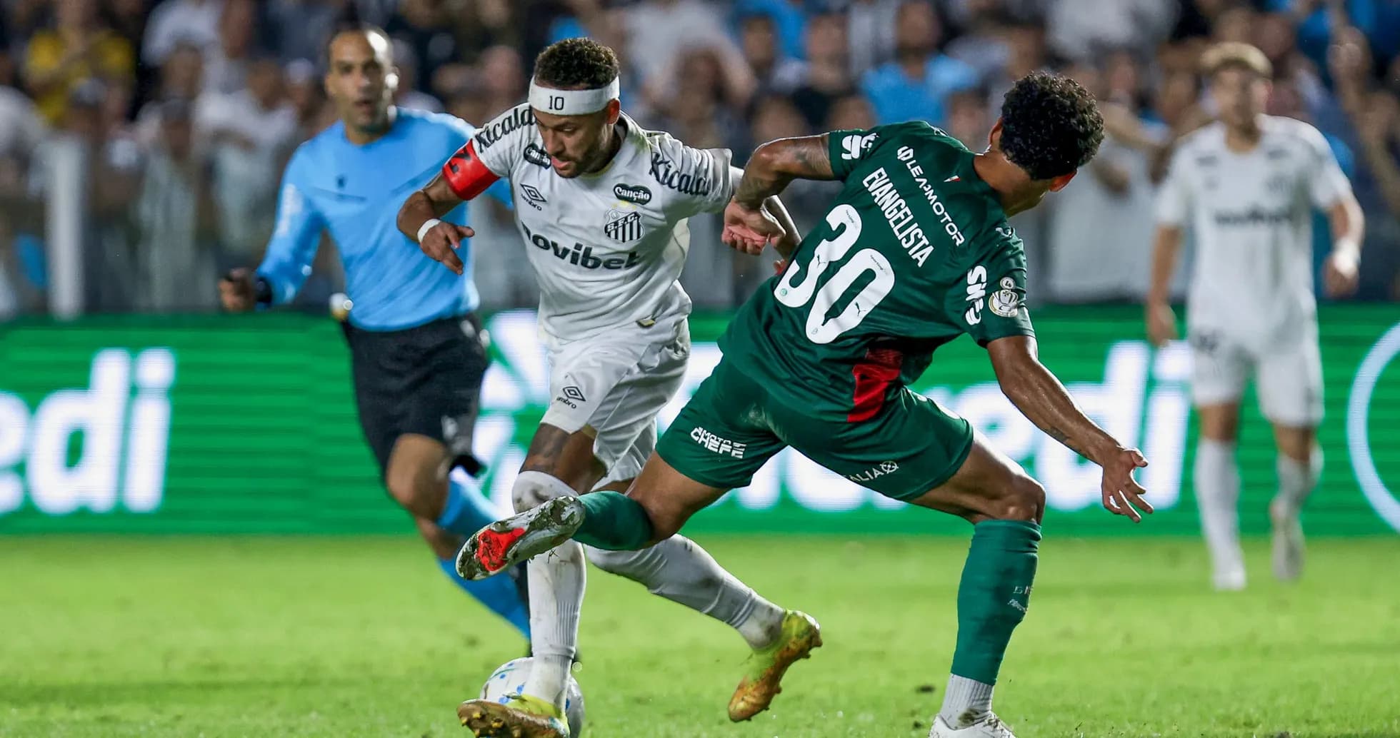 Player dribbling past opponent during soccer match