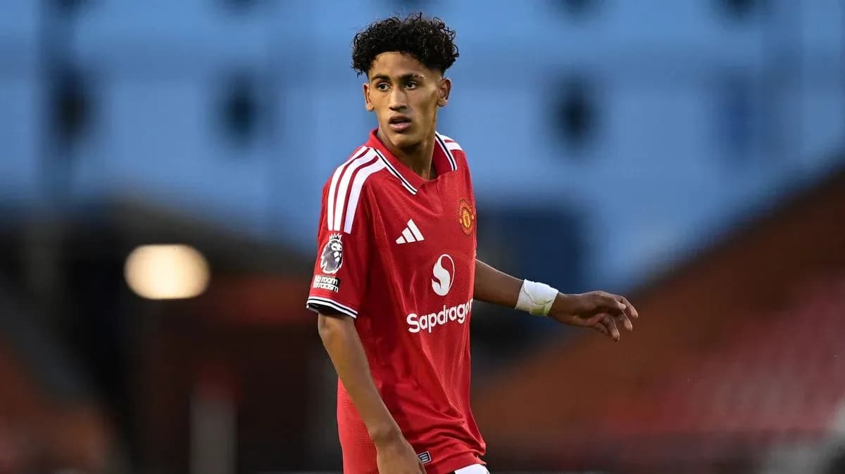 Player in red Manchester United kit on the pitch