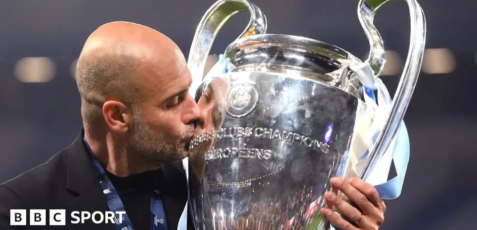 Coach kissing UEFA Champions League trophy celebration