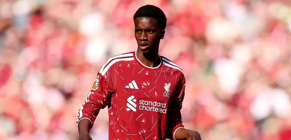 Player in Liverpool jersey during match action