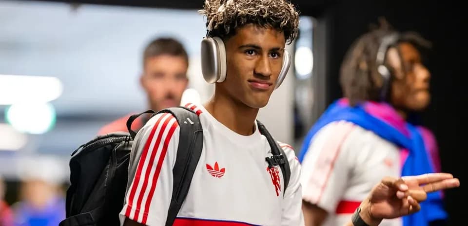 Player wearing headphones walking through the tunnel