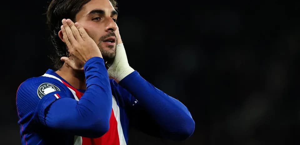 Player holding his head in frustration during match
