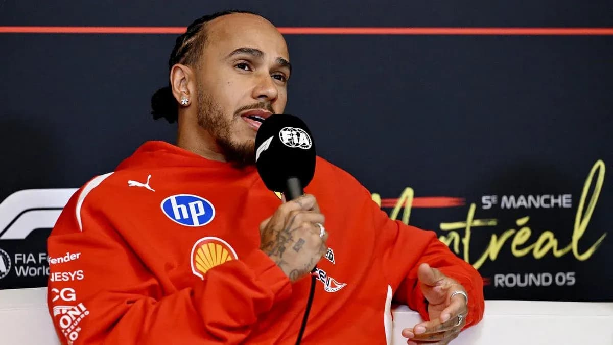 Driver speaking into microphone at press conference