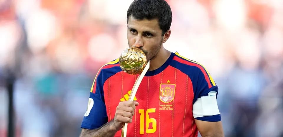 Player holding trophy after winning the tournament