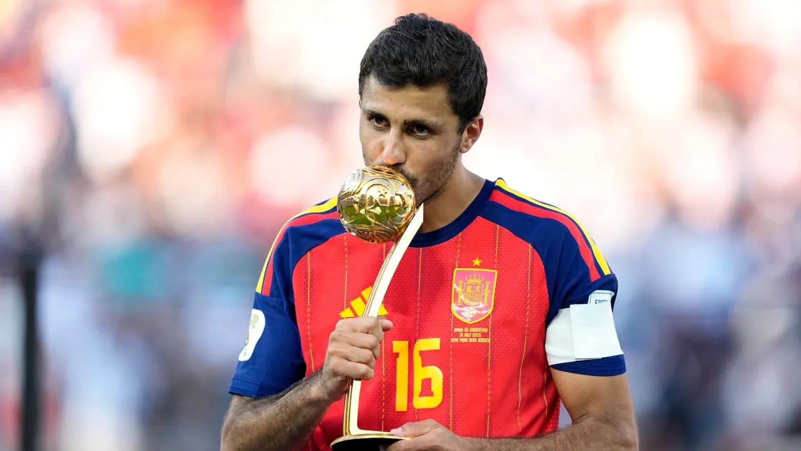 Player holding trophy after winning the tournament