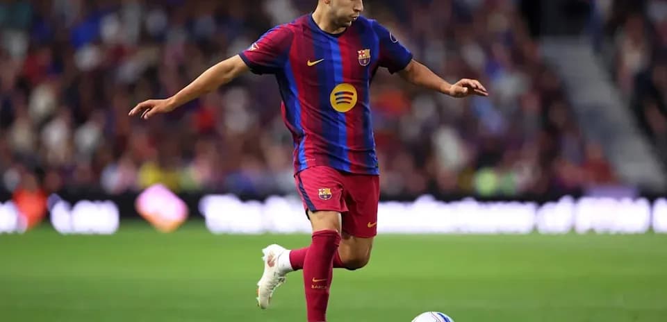 Player in Barcelona kit preparing to kick ball