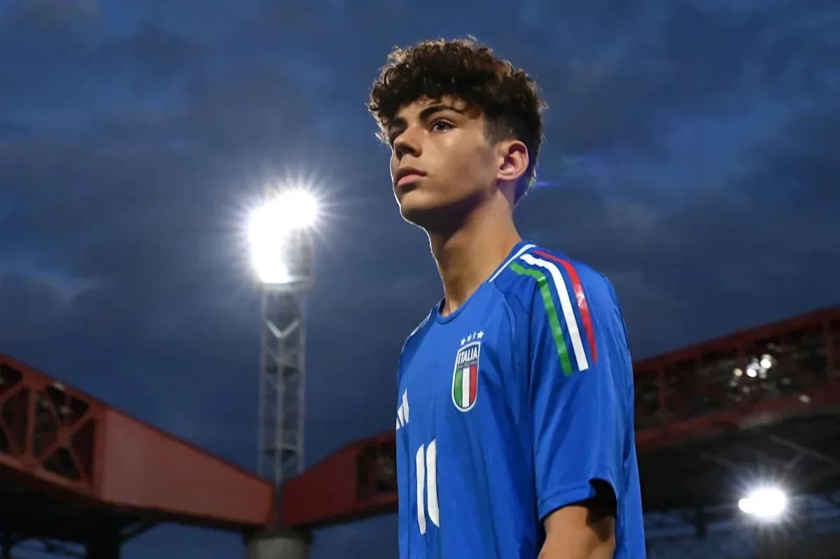 Young player in Italy jersey at stadium