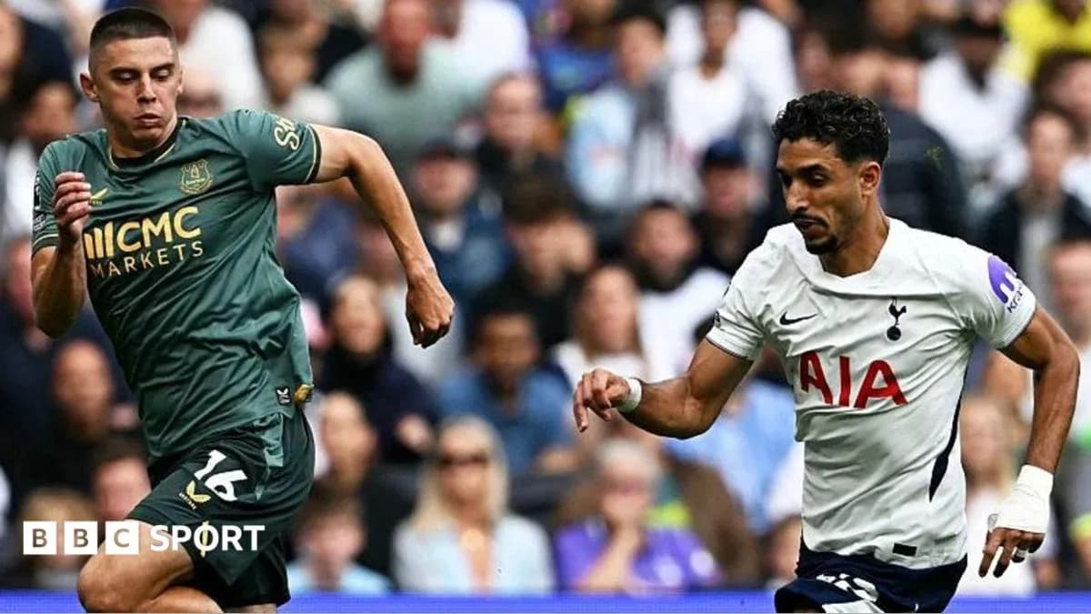 Two players sprinting during a football match