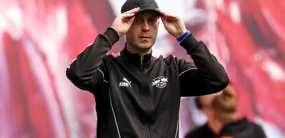 Coach adjusting cap during training session
