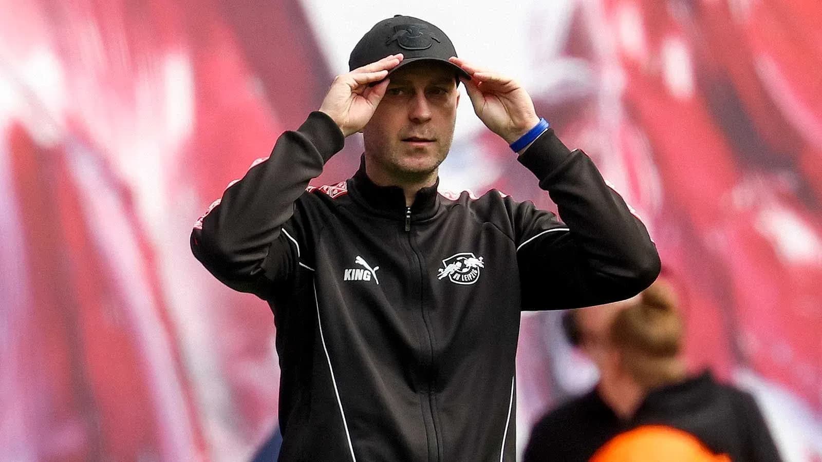 Coach adjusting cap during training session