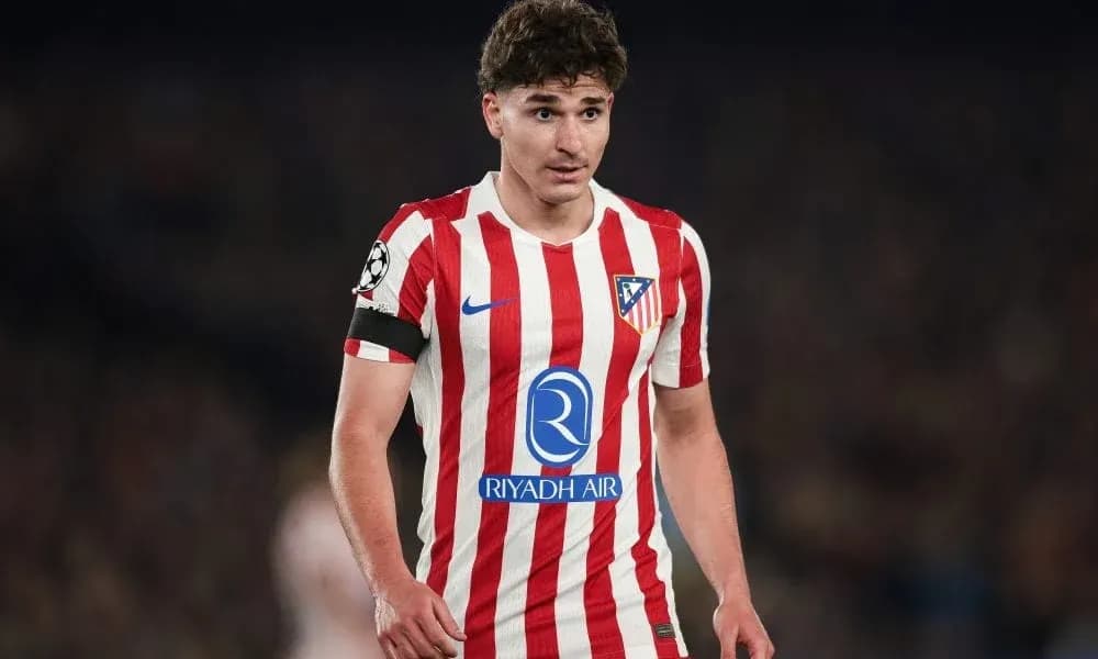 Atletico Madrid player in striped home kit