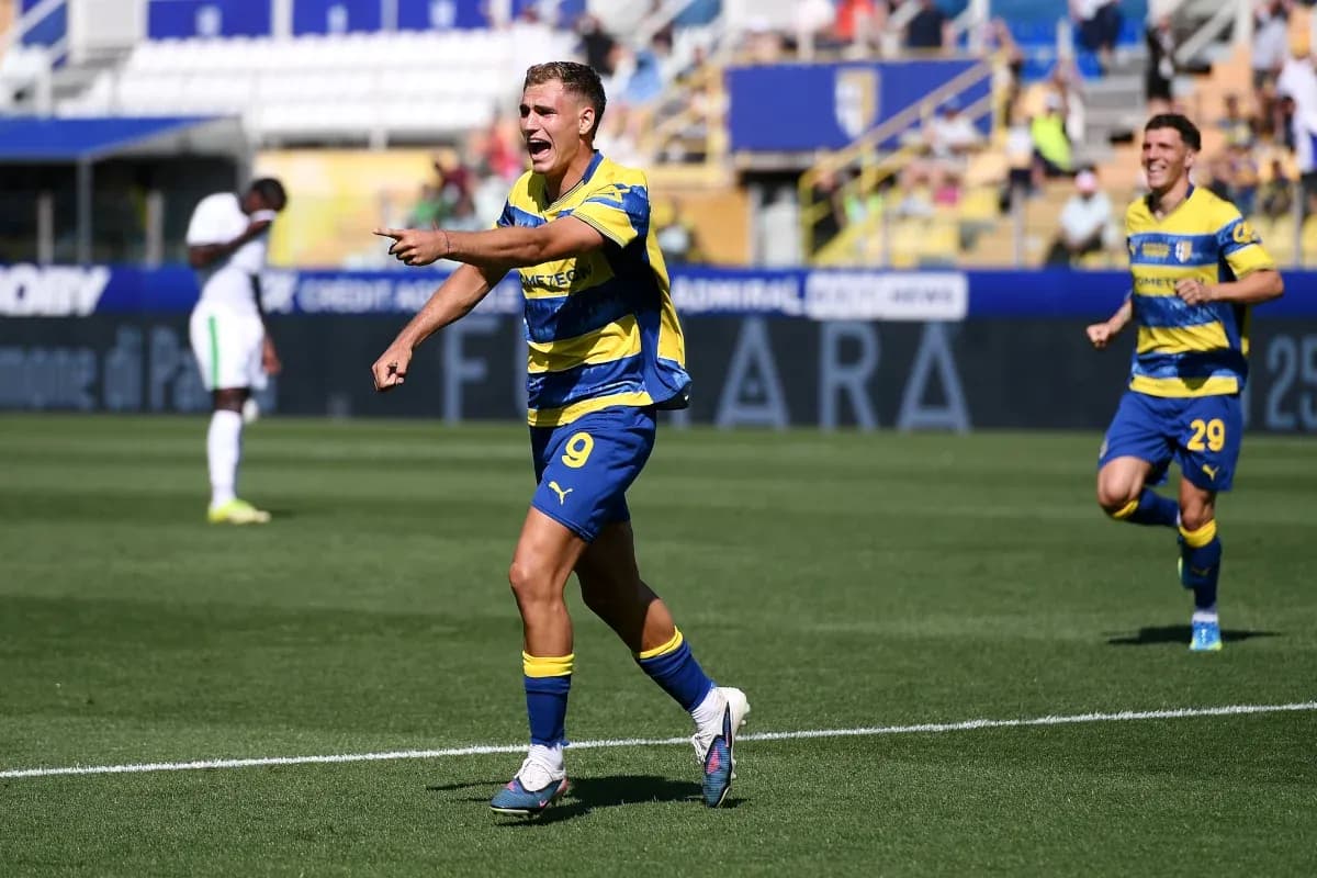 Parma player celebrating a goal during match