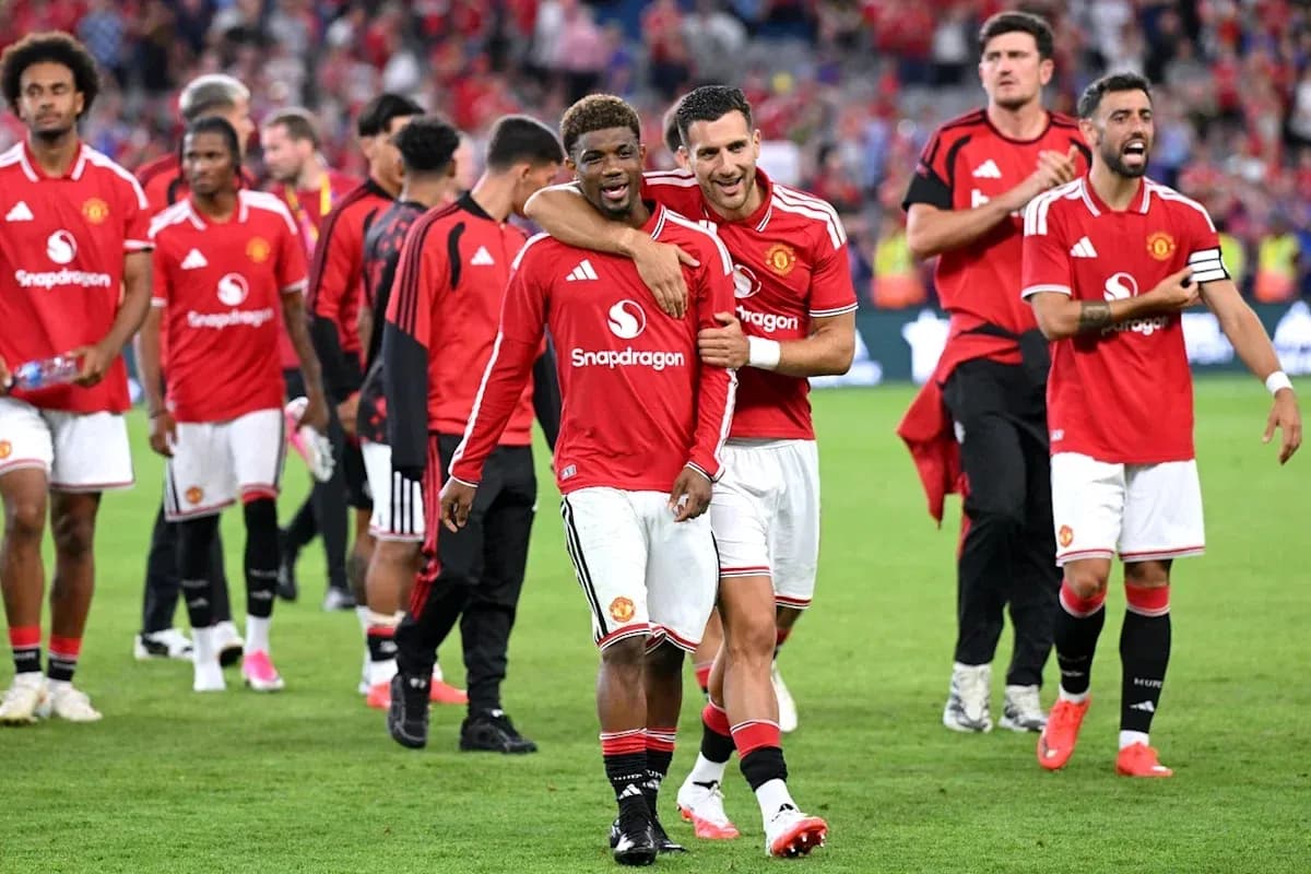 Manchester United players celebrating after a match