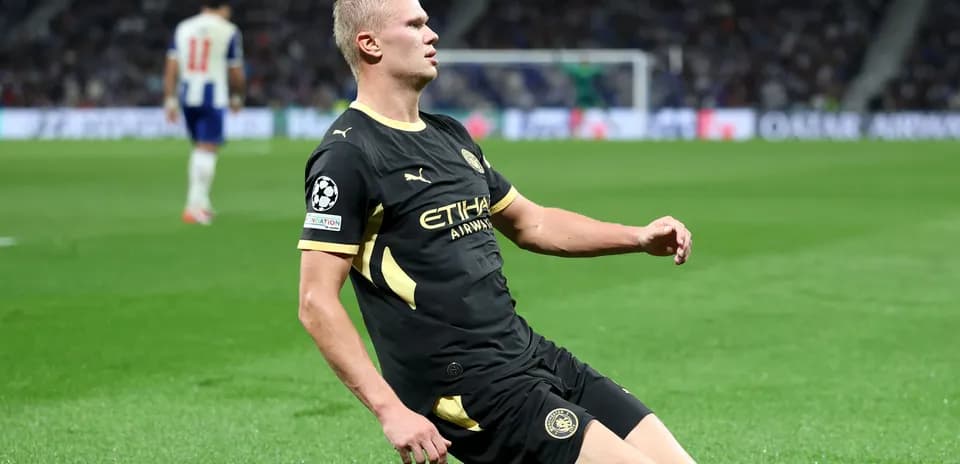 Player kneeling on field during UEFA Champions League match