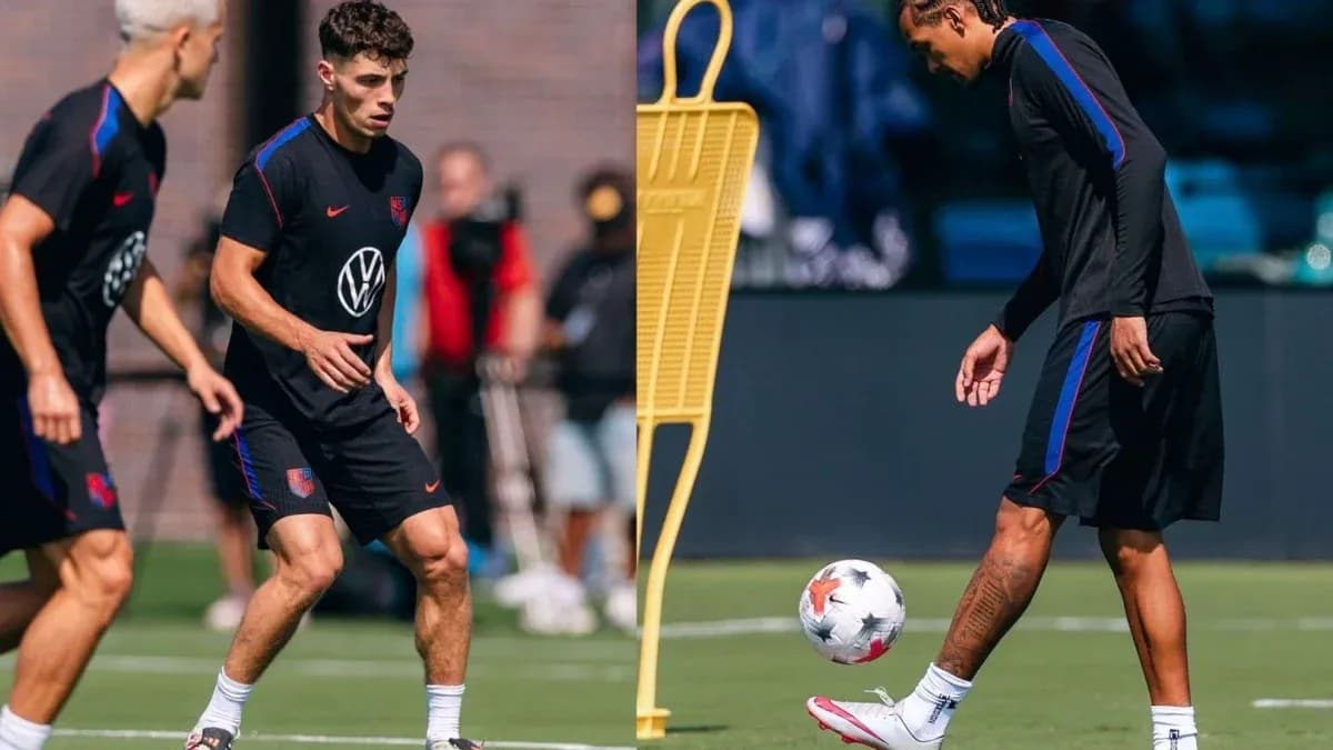 Two players training with a ball on the field