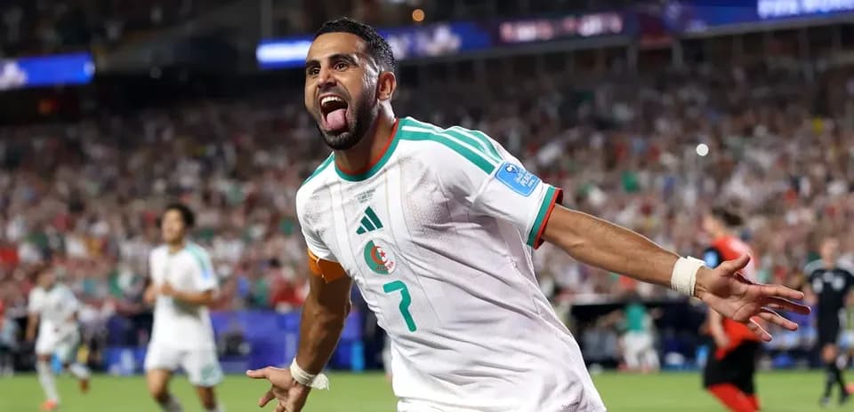 Algeria player celebrating goal during match