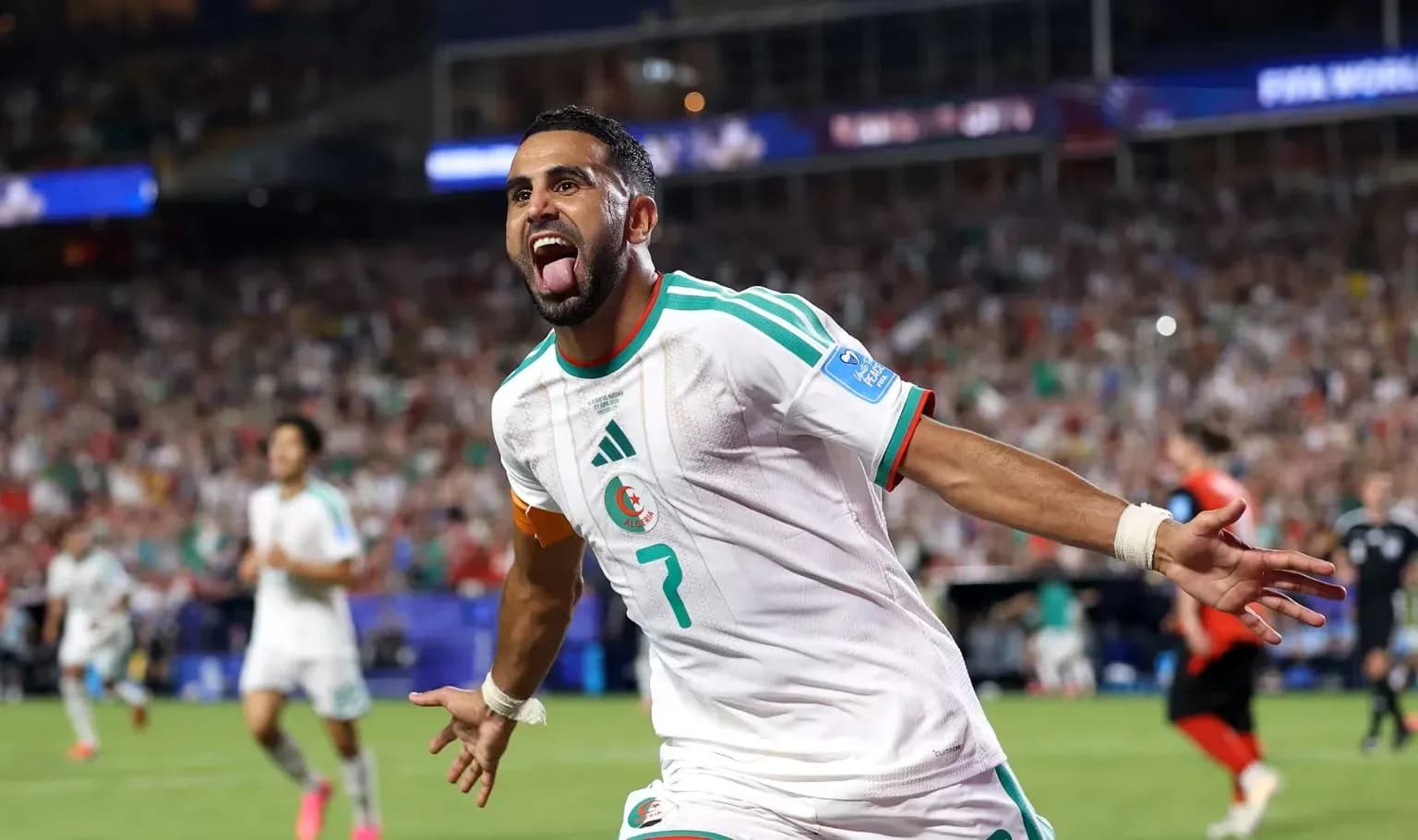 Algeria player celebrating goal during match