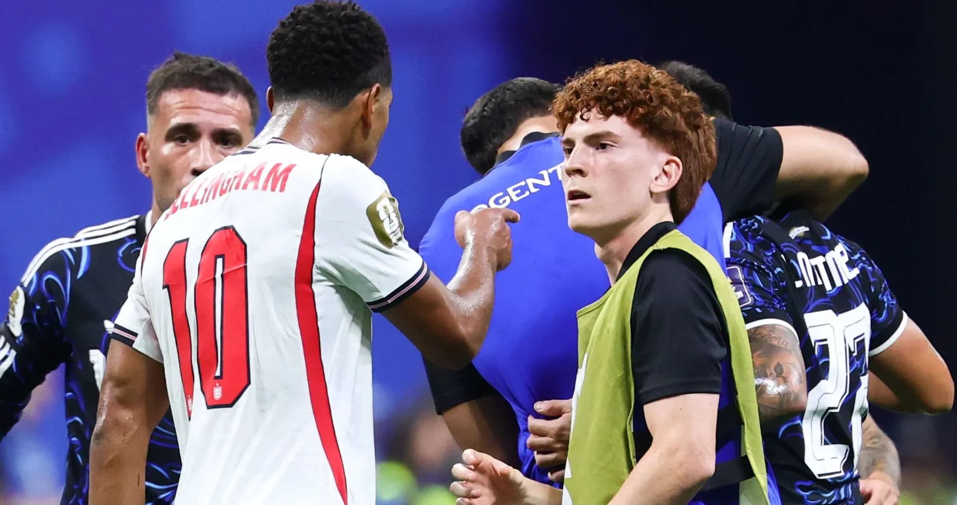 Players interacting during a match with a goalkeeper