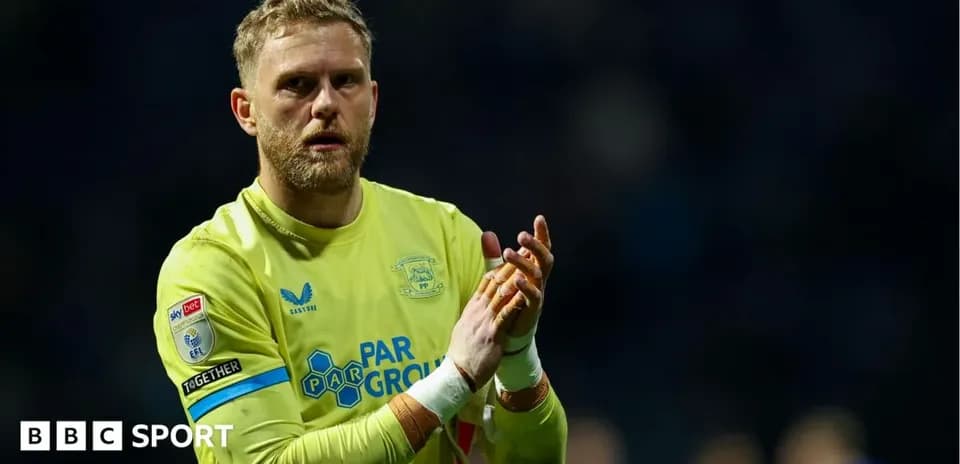 Goalkeeper clapping hands after the match