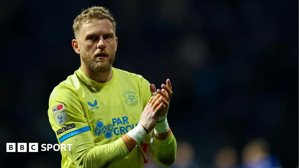 Goalkeeper clapping hands after the match