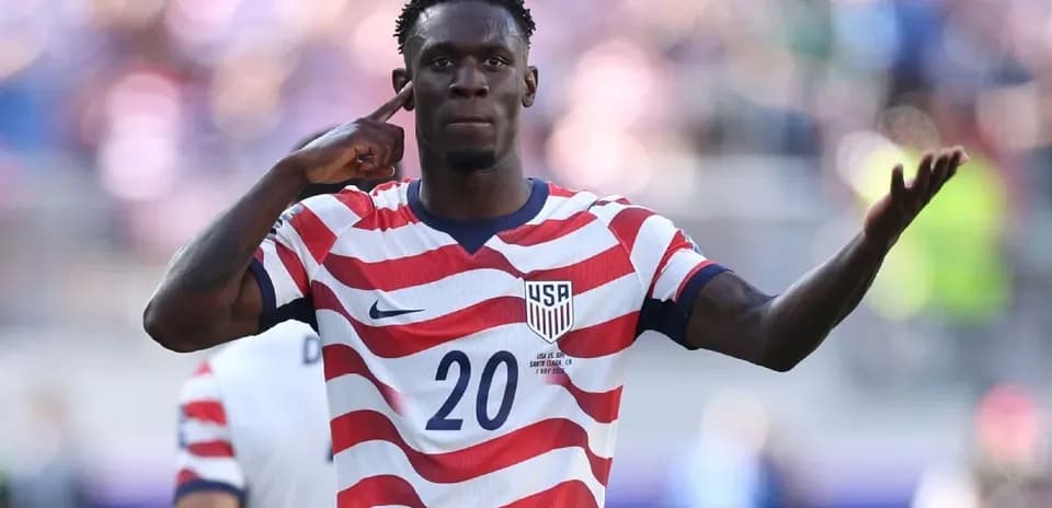 Player celebrating during a soccer match for USA