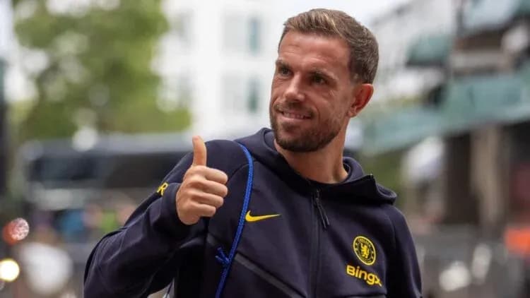 Player giving a thumbs up outside stadium
