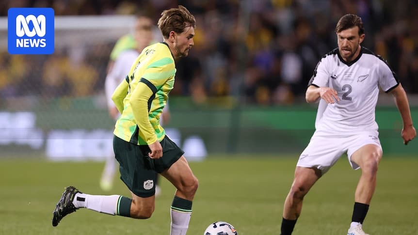 Player dribbling ball during match against New Zealand