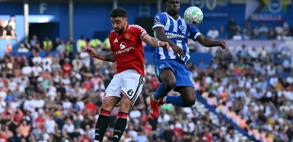 Player from Manchester United and Brighton contesting the ball