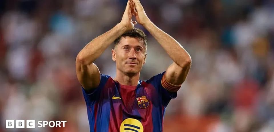 Player applauding fans during match at stadium