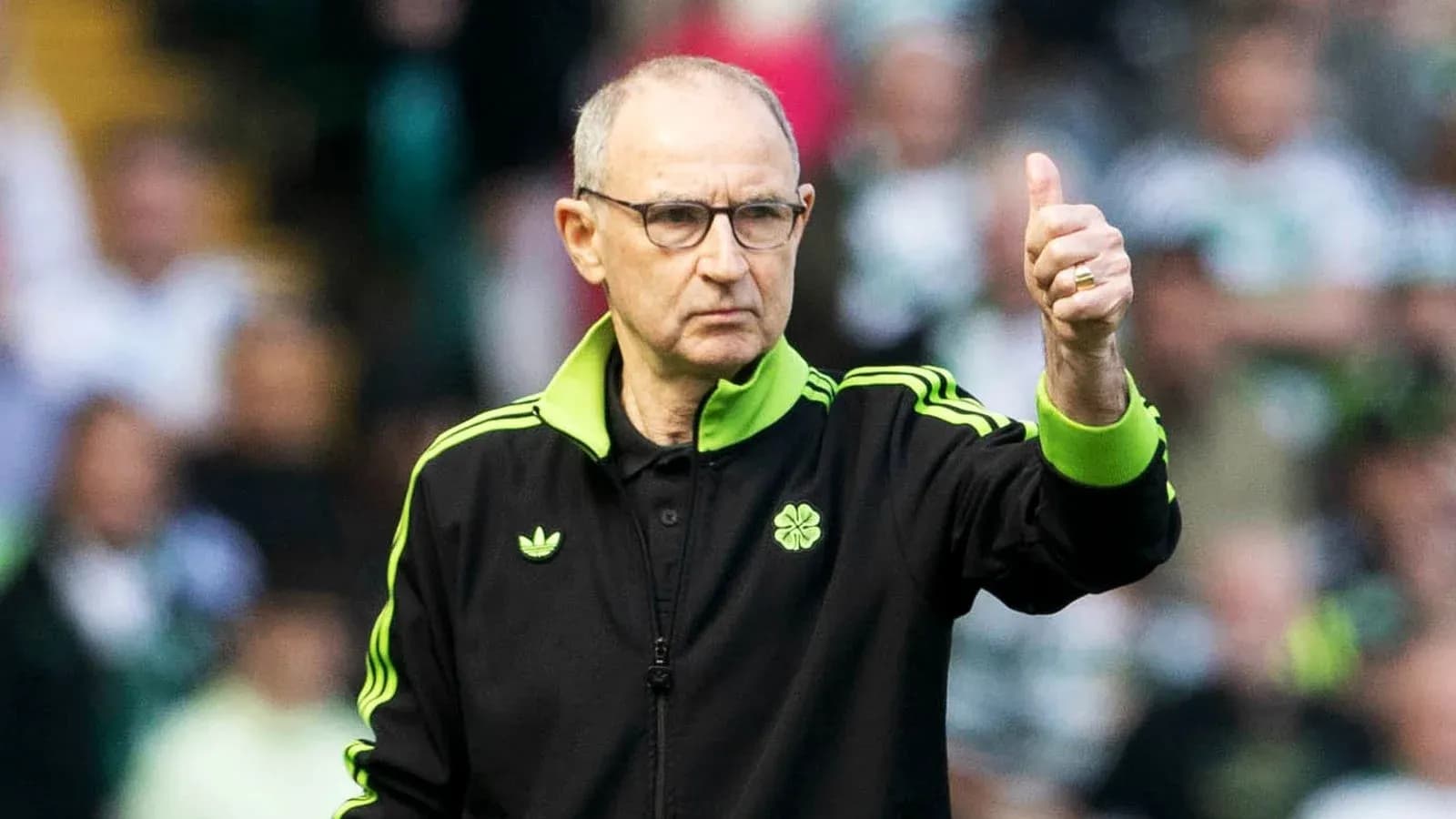 Manager giving a thumbs up on the sideline