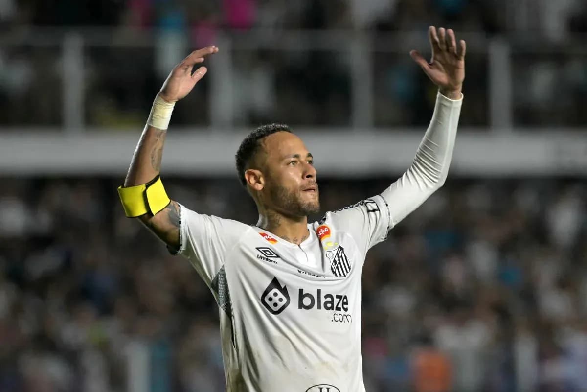 Player celebrating with arms raised during match