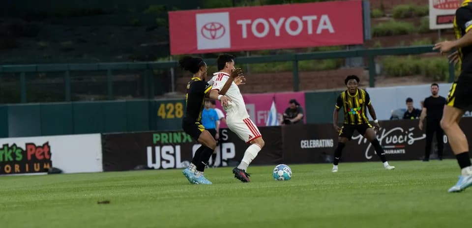 Players competing during New Mexico United match
