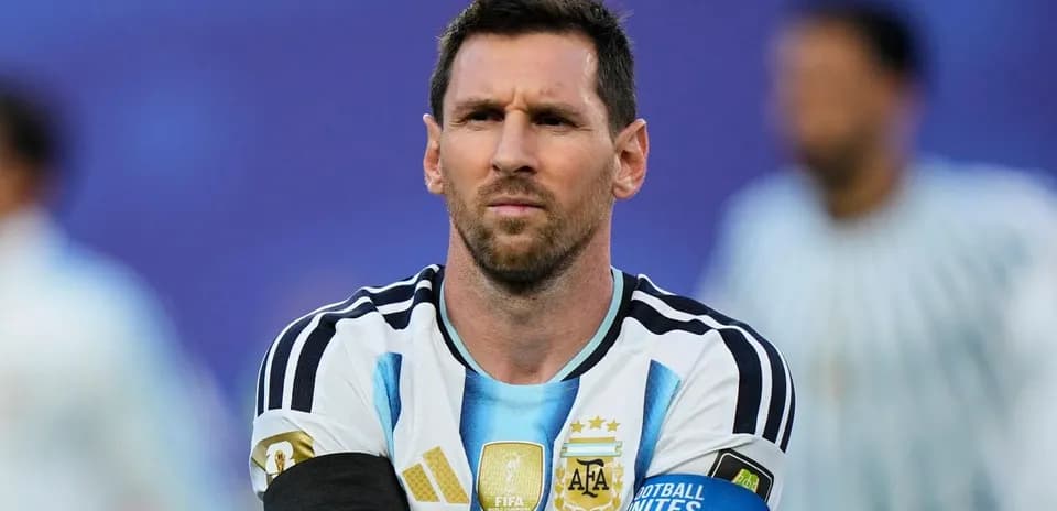 Player in Argentina jersey with captain's armband