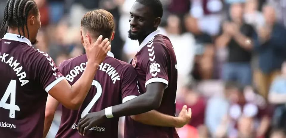 Hearts players celebrating during a match