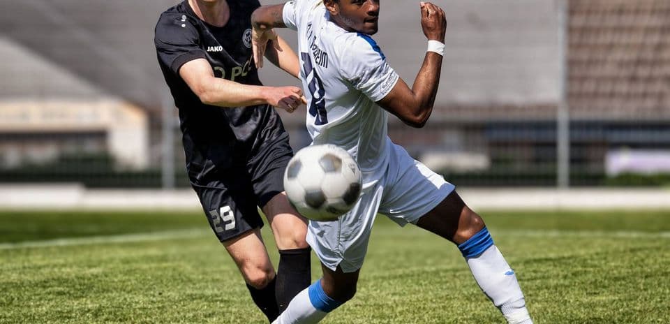 Player kicking ball during Monheim vs Germania Ratingen
