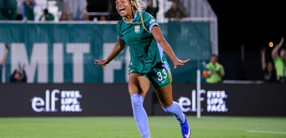 Player celebrating a goal on the field