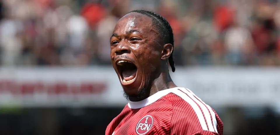 Player celebrating with a loud shout on field