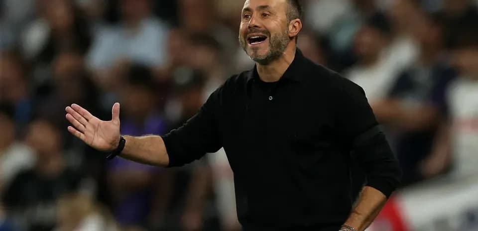 Coach directing players during a match