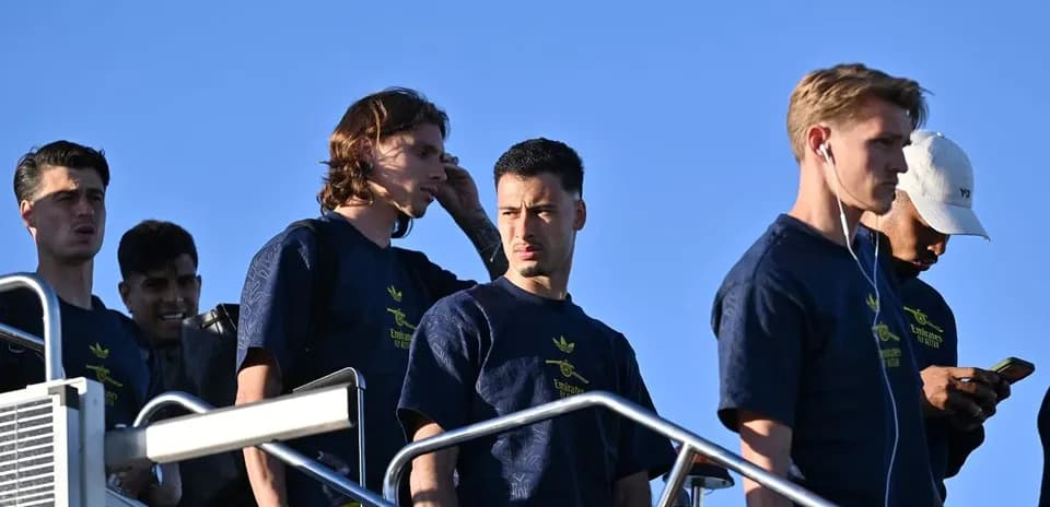 Players walking down steps in team apparel