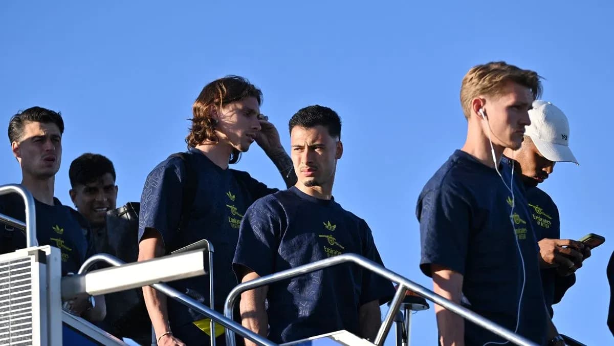 Players walking down steps in team apparel
