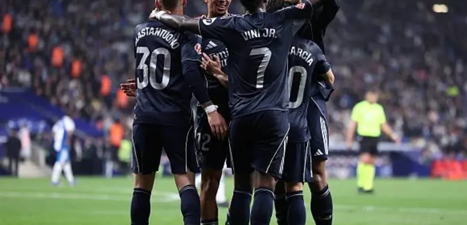 Real Madrid players celebrating a goal