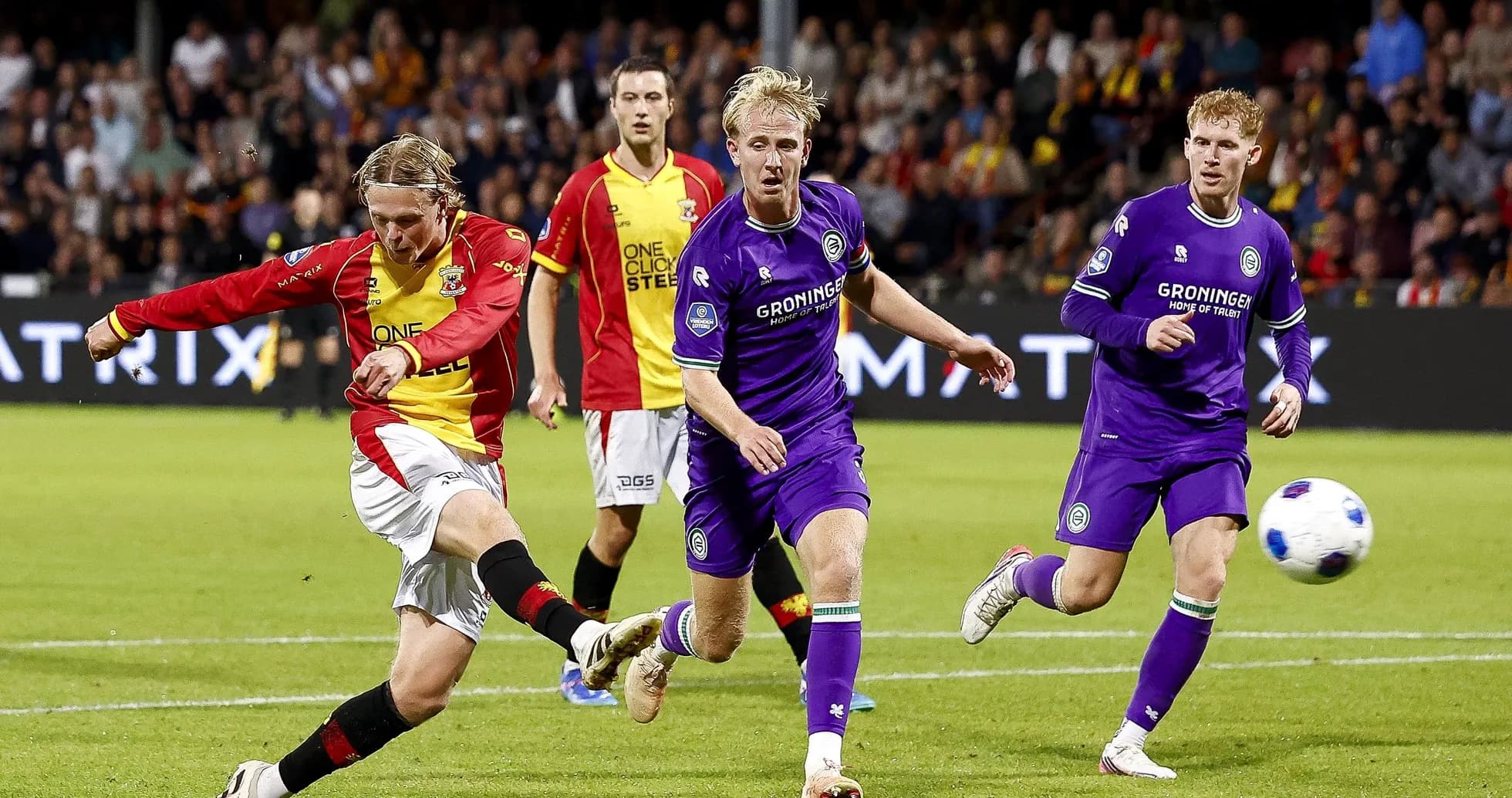Player shooting the ball during a soccer match