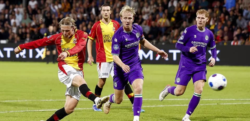 Player shooting the ball during a soccer match
