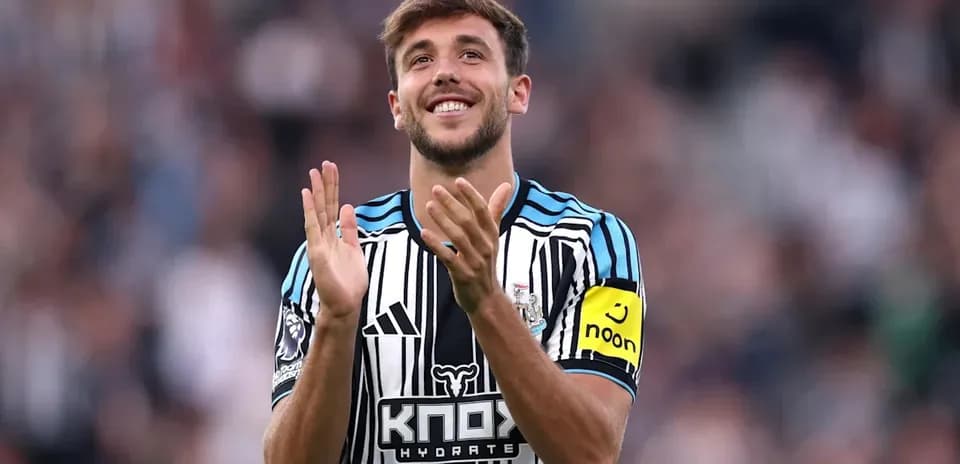 Player applauding fans during a match celebration