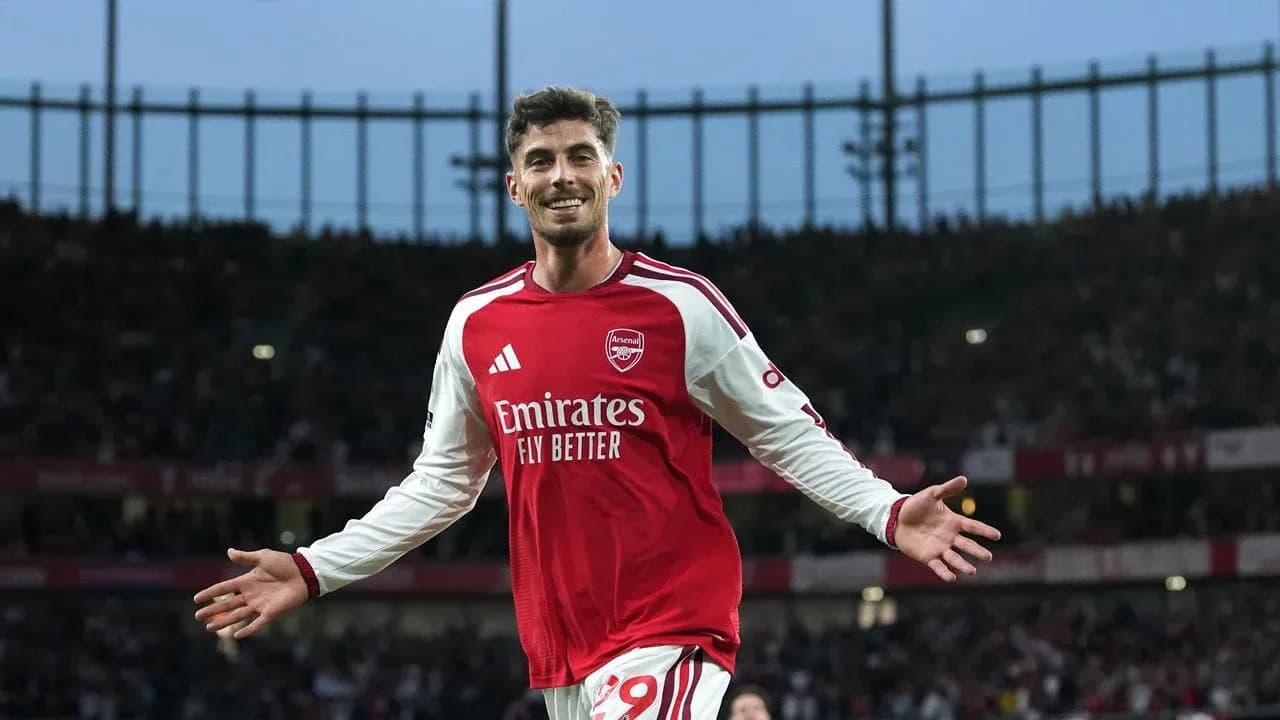Arsenal player celebrating a goal at the stadium