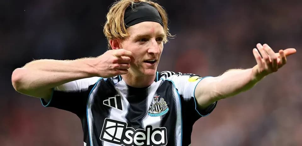 Newcastle player gesturing during match action