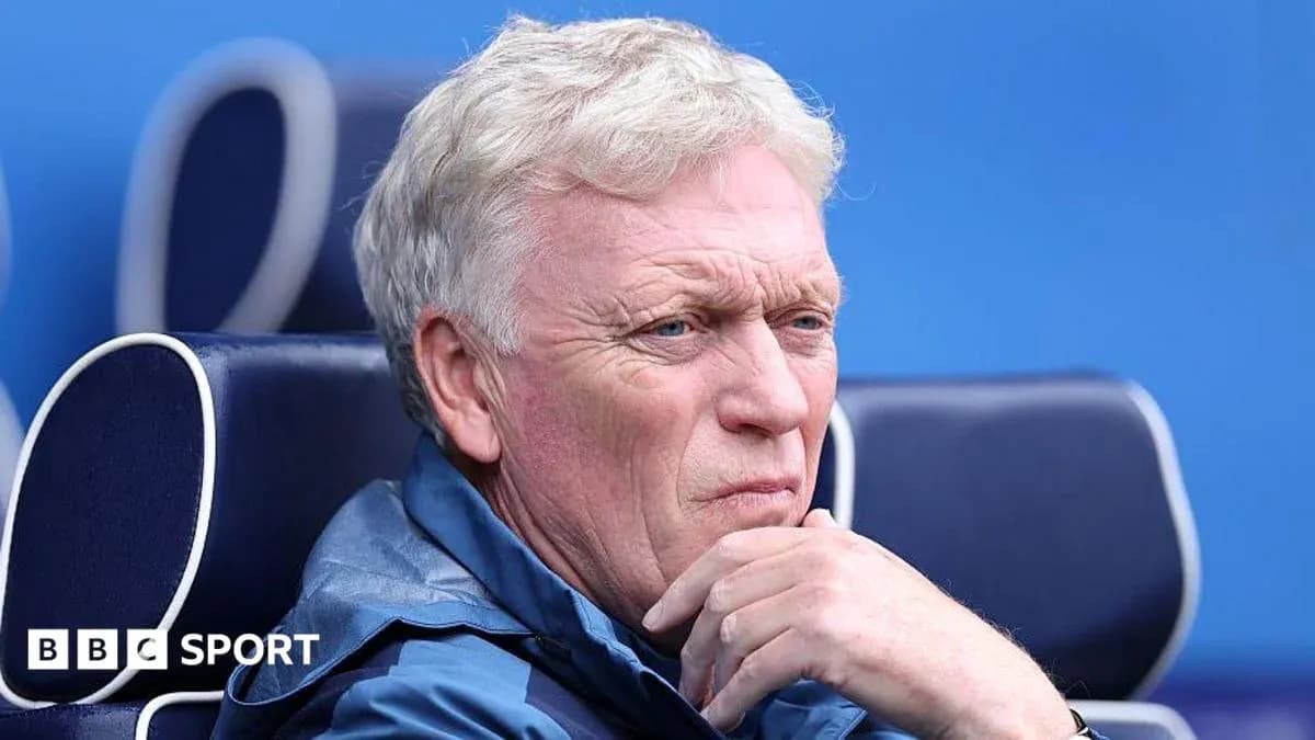 Coach sitting on the bench during a match Coach sitting on the bench during a match