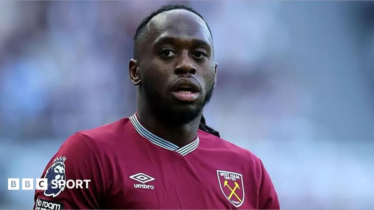 West Ham player in maroon jersey on field West Ham player in maroon jersey on field
