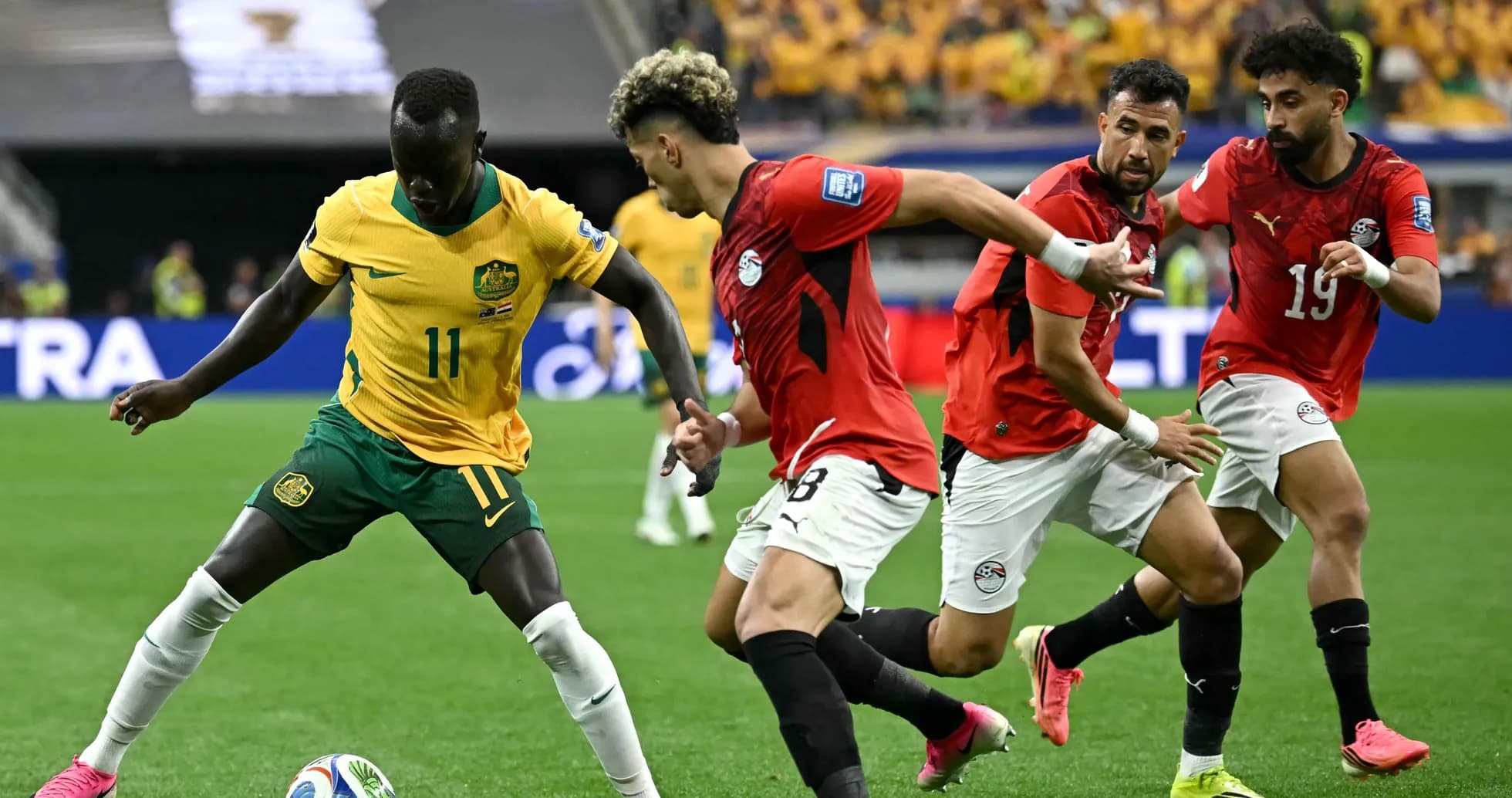 Player dribbling the ball surrounded by defenders Player dribbling the ball surrounded by defenders