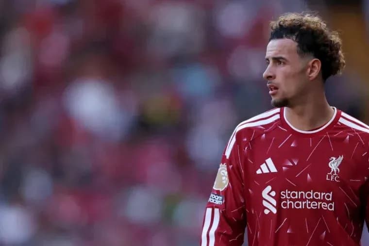Liverpool player on the pitch during match Liverpool player on the pitch during match